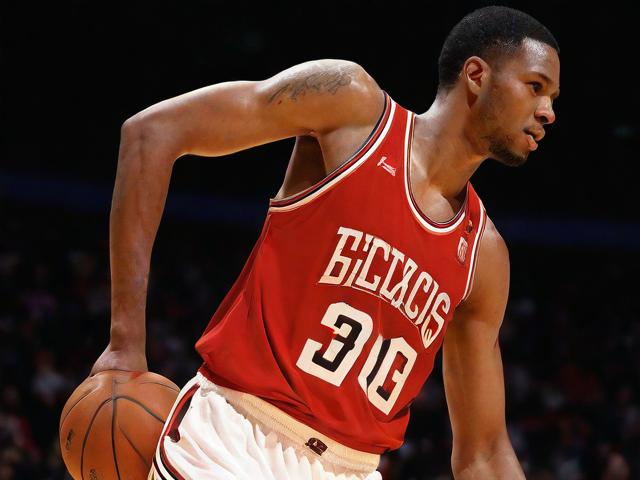 “九游app_ 历史回顾：NBA几十年来的十大经典封盖”，nba封面设计